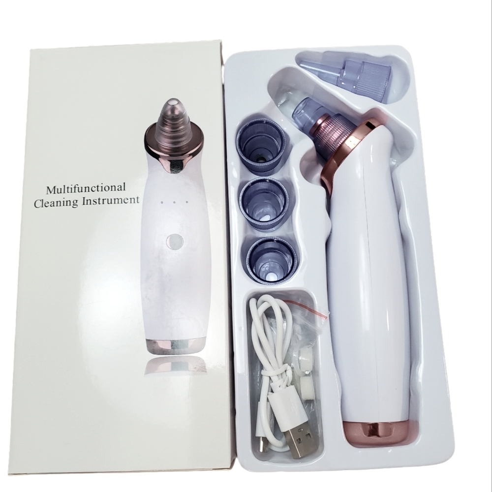 Pore cleaning facial beauty tool. New in box. White & Rose Gold